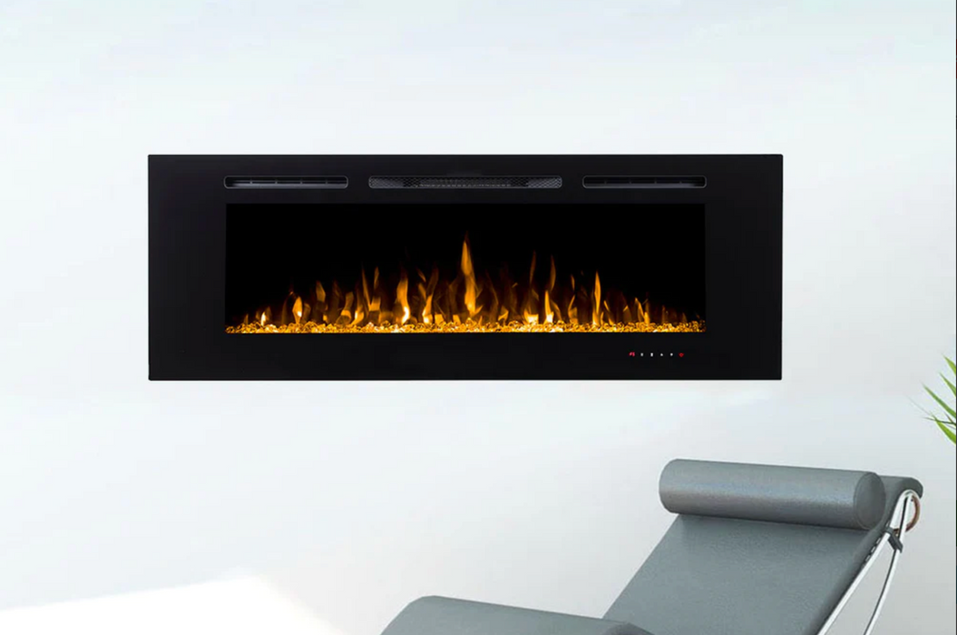 Modern Flames Challenger Series Built-In 60" Electric Fireplace Mounted on White Wall Next To a Chair