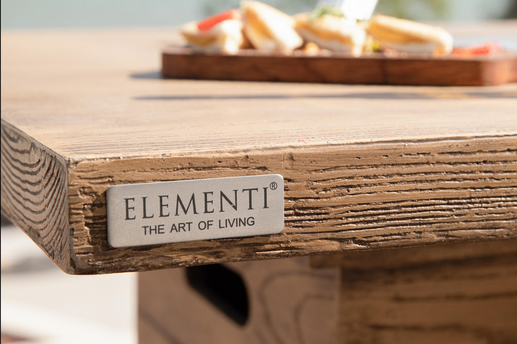 Elementi Rova OFG224 Fire Pit Bar Table Close up Image on Elementi Logo